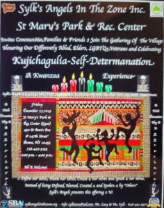 Colorful mural promoting Kwanzaa and self-determination at St. Mary's Park.